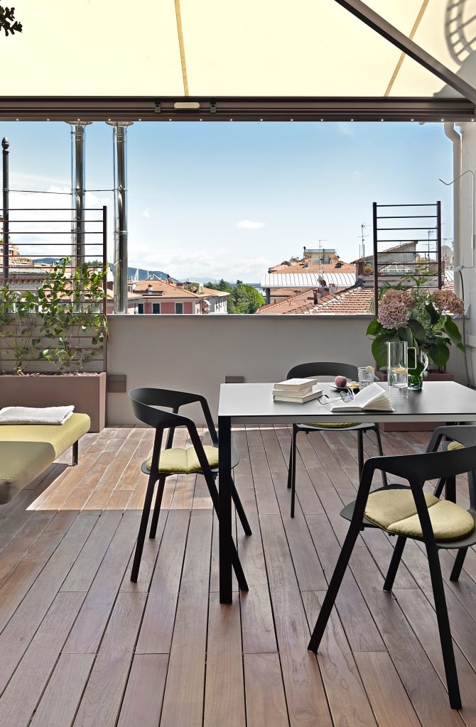 modern-dining-table-and-the-sofa-in-the-terrace-2026-01-07-06-12-14-utc